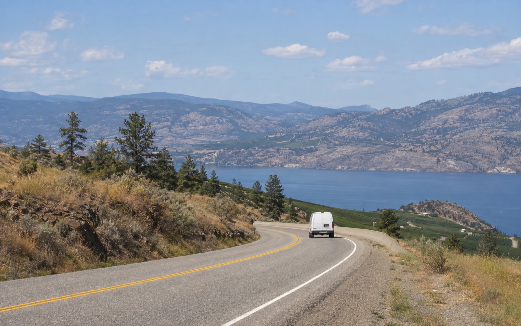Unbranded service van travelling on an interior British Columbia route
